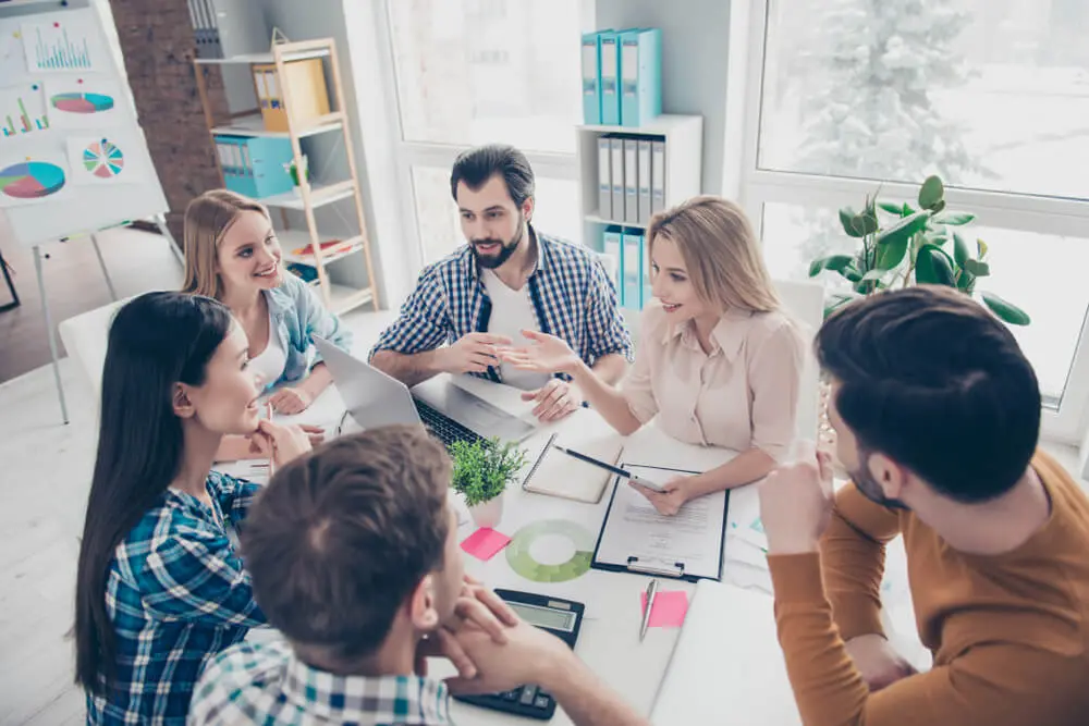 financiers sitting in modern office speaking, communicate, discussing, expressing opinions, view